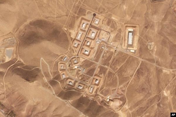 This satellite photo from Planet Labs PBC shows damaged buildings at Iran's Khojir military ba<em></em>se outside of Tehran, Oct. 8, 2024. (Planet Labs PBC via AP)