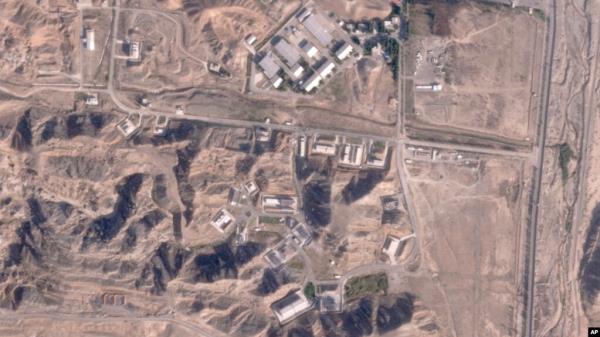 This satellite photo from Planet Labs PBC shows damaged buildings at Iran's Parchin military ba<em></em>se outside of Tehran, Oct. 27, 2024. (Planet Labs PBC via AP)