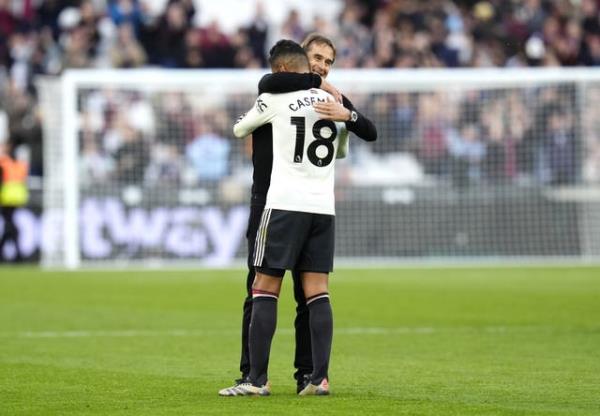 West Ham manager Julen Lopetegui hugs Manchester United’s Casemiro 