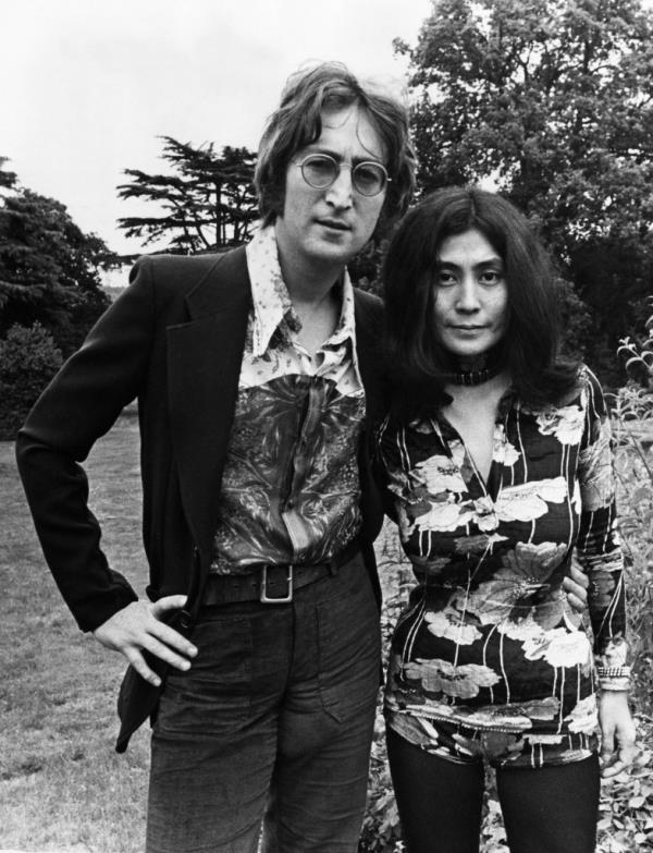 John Lennon and Yoko Ono standing together at their Tittenhurst home in August 1971, shortly before moving to New York City