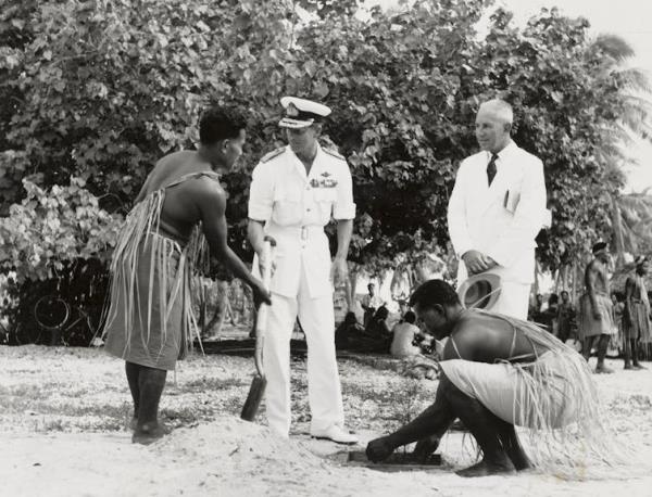 Prince Philip, the duke of Edinburgh, plants a commemorative tree on Kiritimati, April 1959